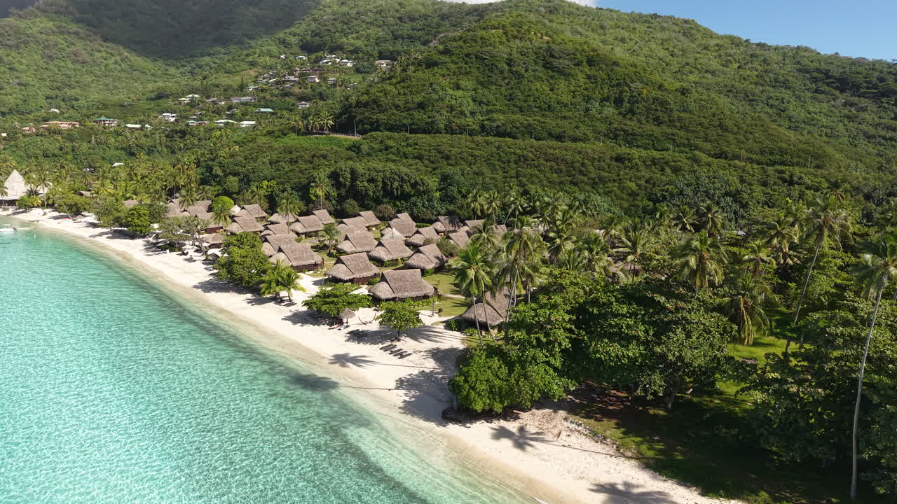 Drone Shot of Moorea Island French Polynesia, Beachfront Villas Part of Luxury Tropical Resort