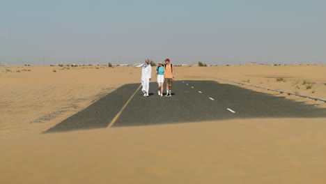 three travelers in the desert