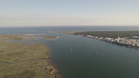 Estuary-of-the-Guadiana-River-and-riverside-city-of-Vila-Real-de-Santo-Antonio,-aerial-view