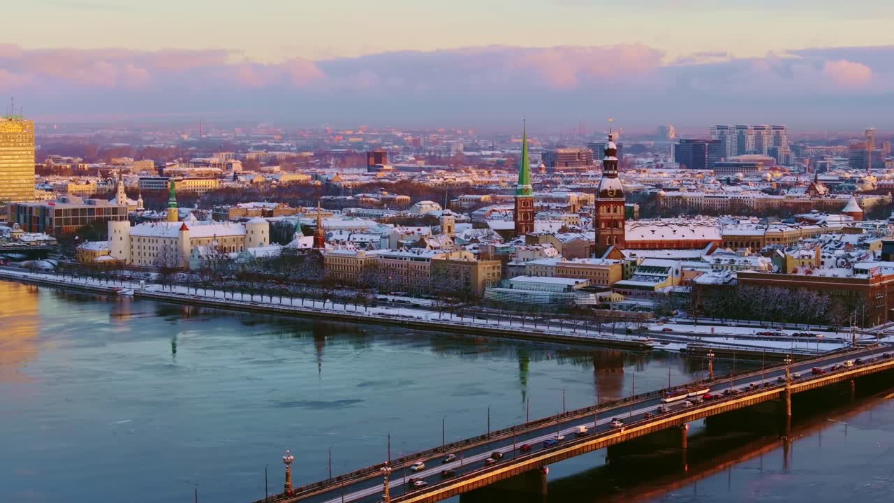 Riga panorama - stunning blend of yellow, pink, violet tones lighting up the sky