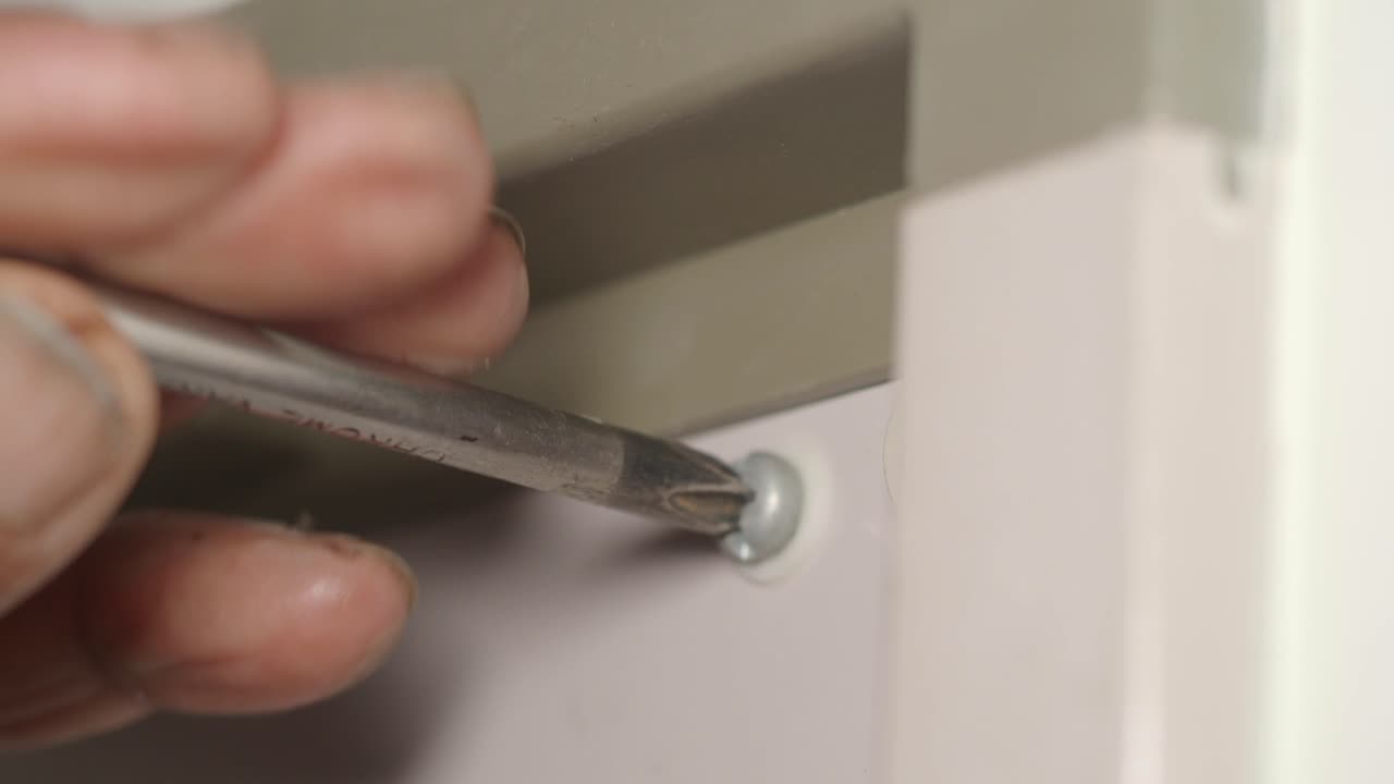Tightening a screw