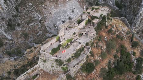 birdseye aerial view over the ruins of castle san giovanni in kotor, montenegro