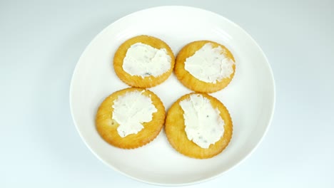 round crackers with herb cheese