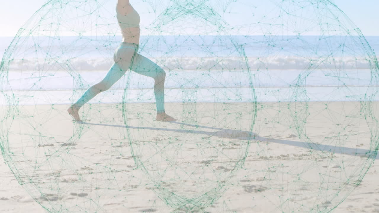 Woman practicing yoga on beach with digital network overlay animation