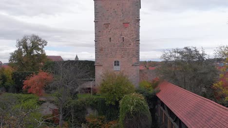 a drone flies against the tower and approaches it