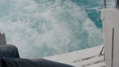 waves from the engines of a high speed boat