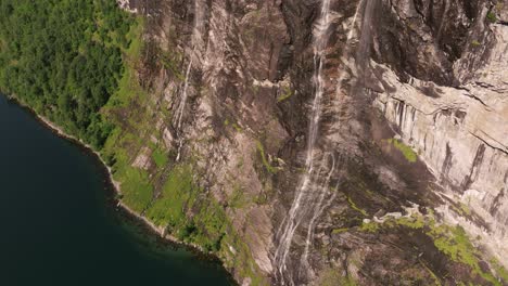 Pan-Up-Reveals-Seven-Sisters-Waterfall-in-Geirangerfjord,-Norway