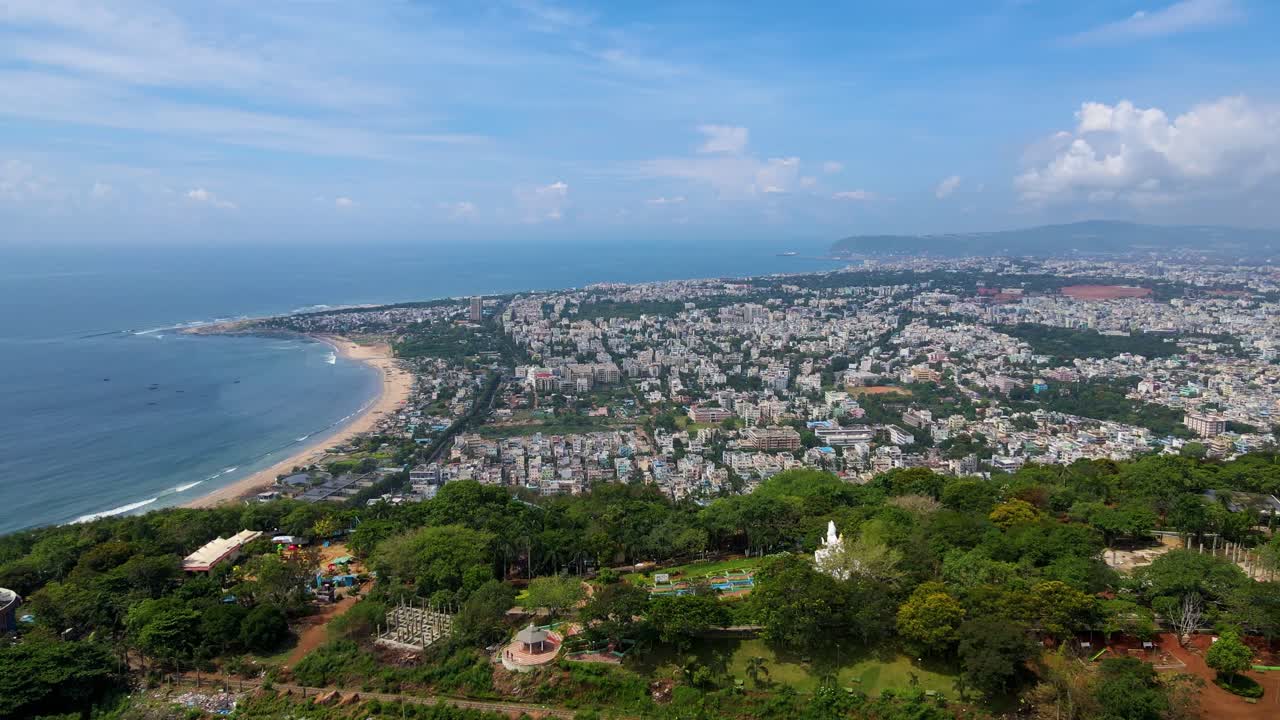 Breathtaking aerial drone shot of Vizag’s iconic skyline and coastal roads, highlighting the dynamic energy of the city.