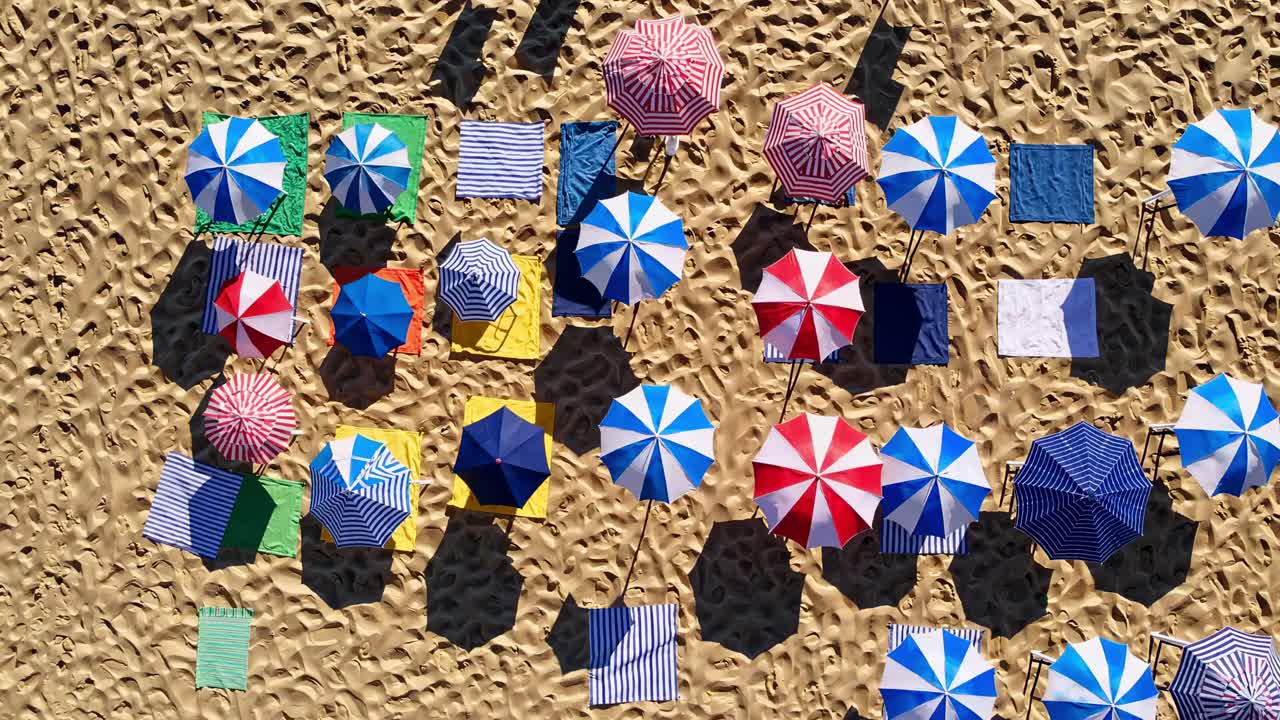 Beach Umbrellas and Towels Aerial View