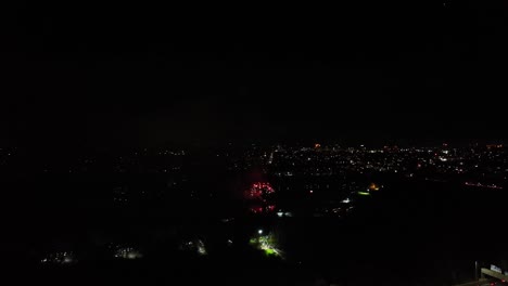 Aerial-shot-of-vibrant-fireworks-being-let-off-signifying-a-new-year