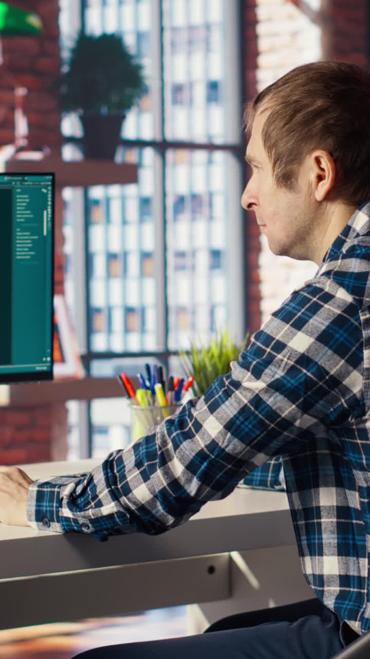 Vertical video Person requesting help from AI LLM chatbot software in modern urban home office