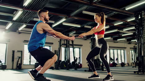 couple partner workout in gym