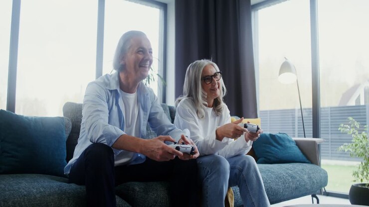 Senior Couple Playing Video Games Together