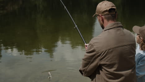 father and son fishing at the lake