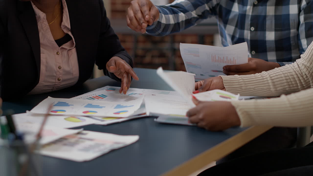 African american team of people doing teamwork to plan project analysis