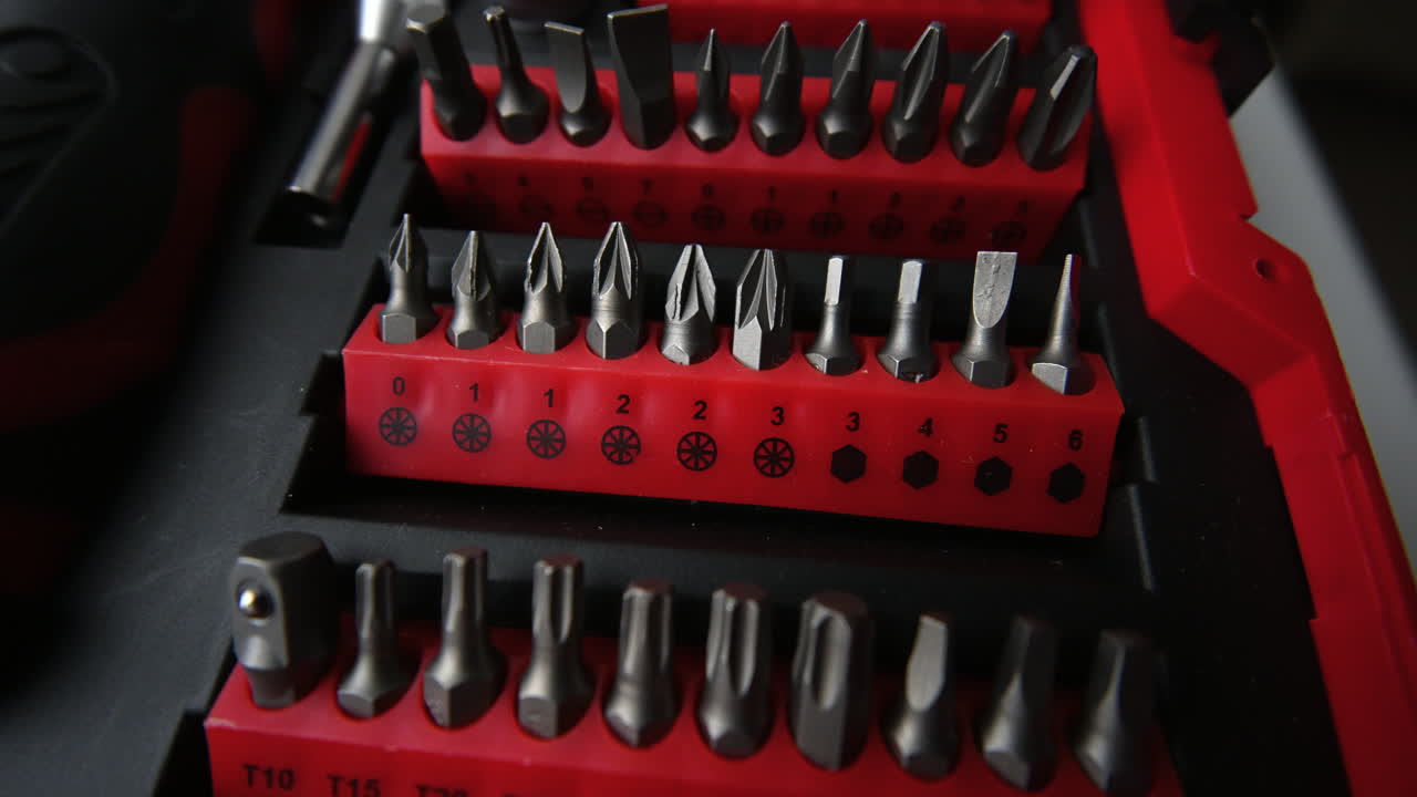 Close up shot of a professional tool kit with screwdriver bits and sockets neatly organized
