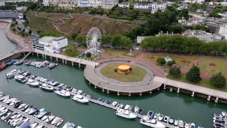 touristic torquay town boat harbor on devon coast, england - aerial