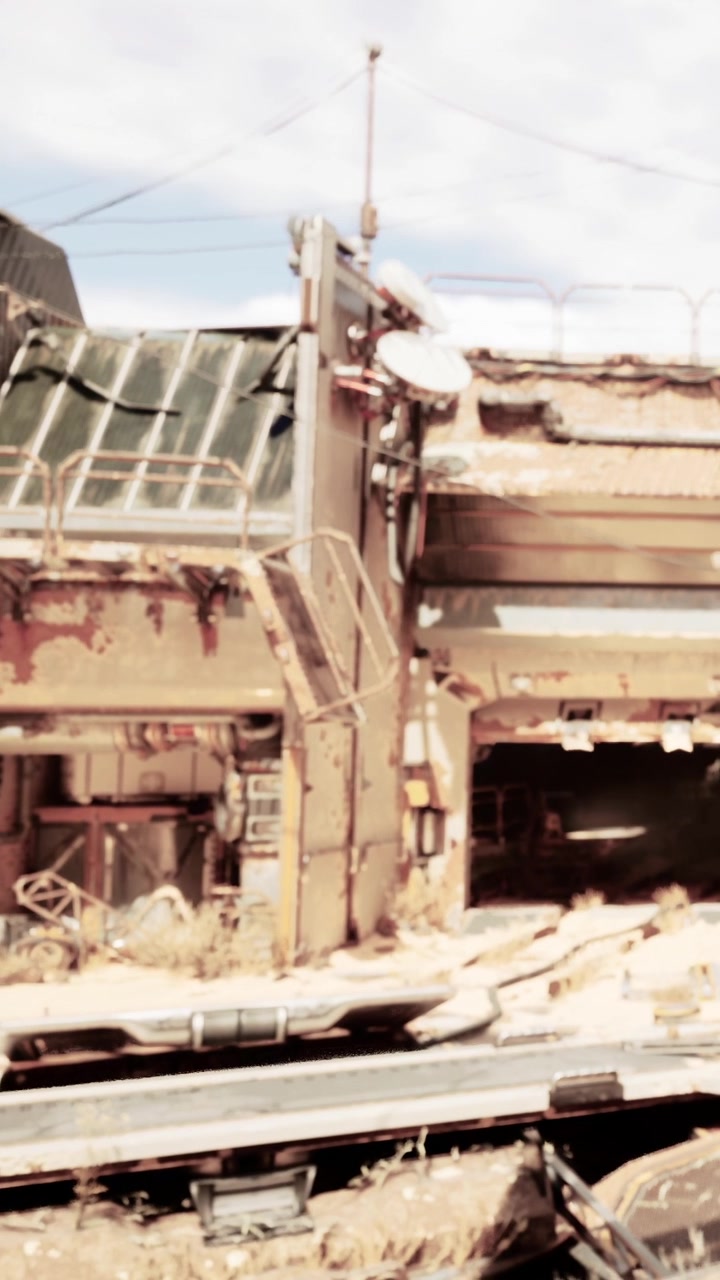 Train station entrance with rust and broken structures in afternoon light