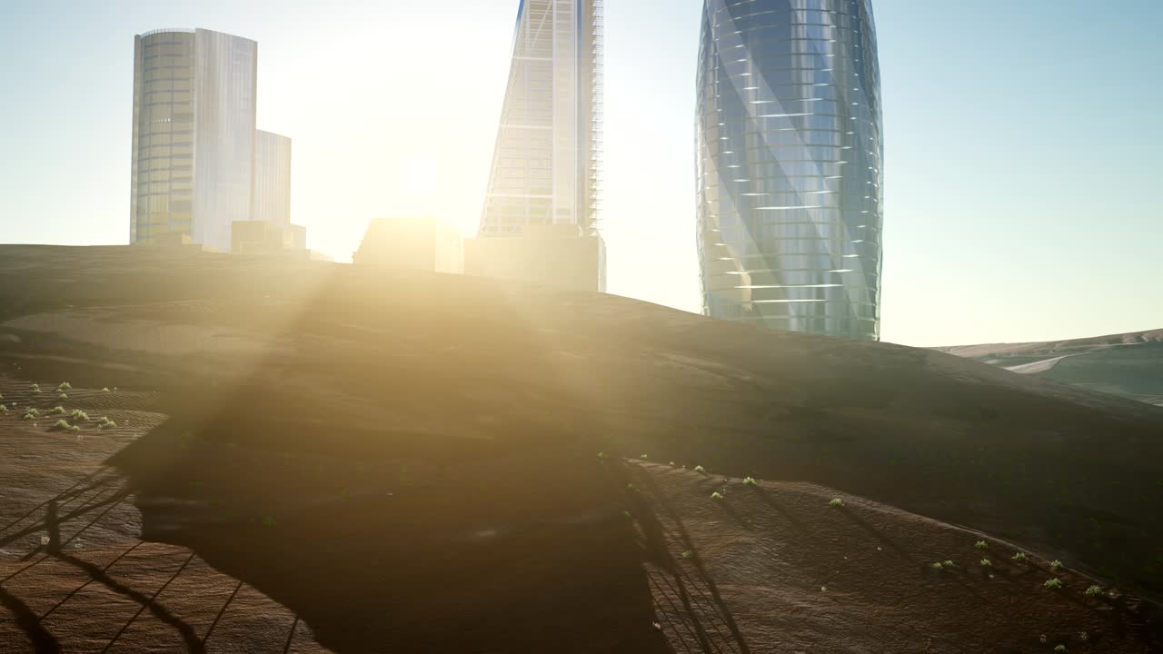 rascacielos de la ciudad en el desierto al atardecer