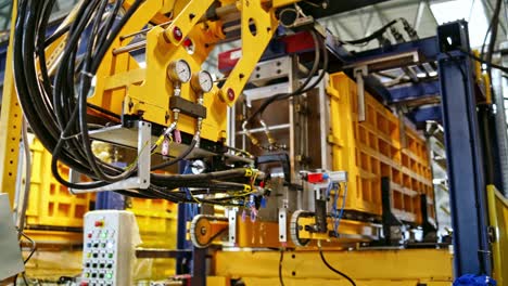 modern equipment inside the factory. automatic machinery on upgraded plant. manufacturing indoors.