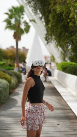 woman enjoying virtual reality experience in a park