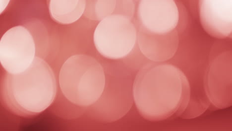 video of flickering white and red bokeh spots of light with copy space