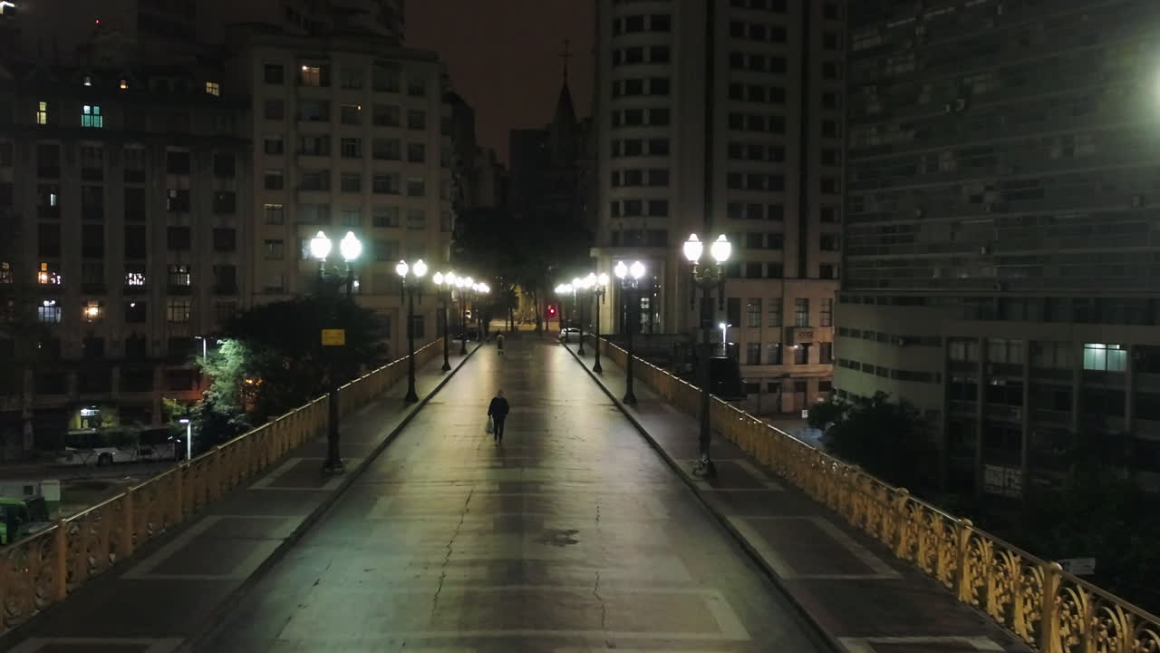 Aerial view of Santa Efigenia viaduct at night with no one in the street, at night, Sao Paulo downtown, Brazil