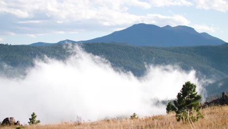 Fog-rises-out-of-canyon-in-the-Rocky-Mountains-outside-Boulder,-Colorado