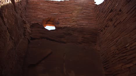 The-sun-shines-above-the-wall-of-the-largest-pueblo-at-Wupatki-National-Monument-in-Arizona