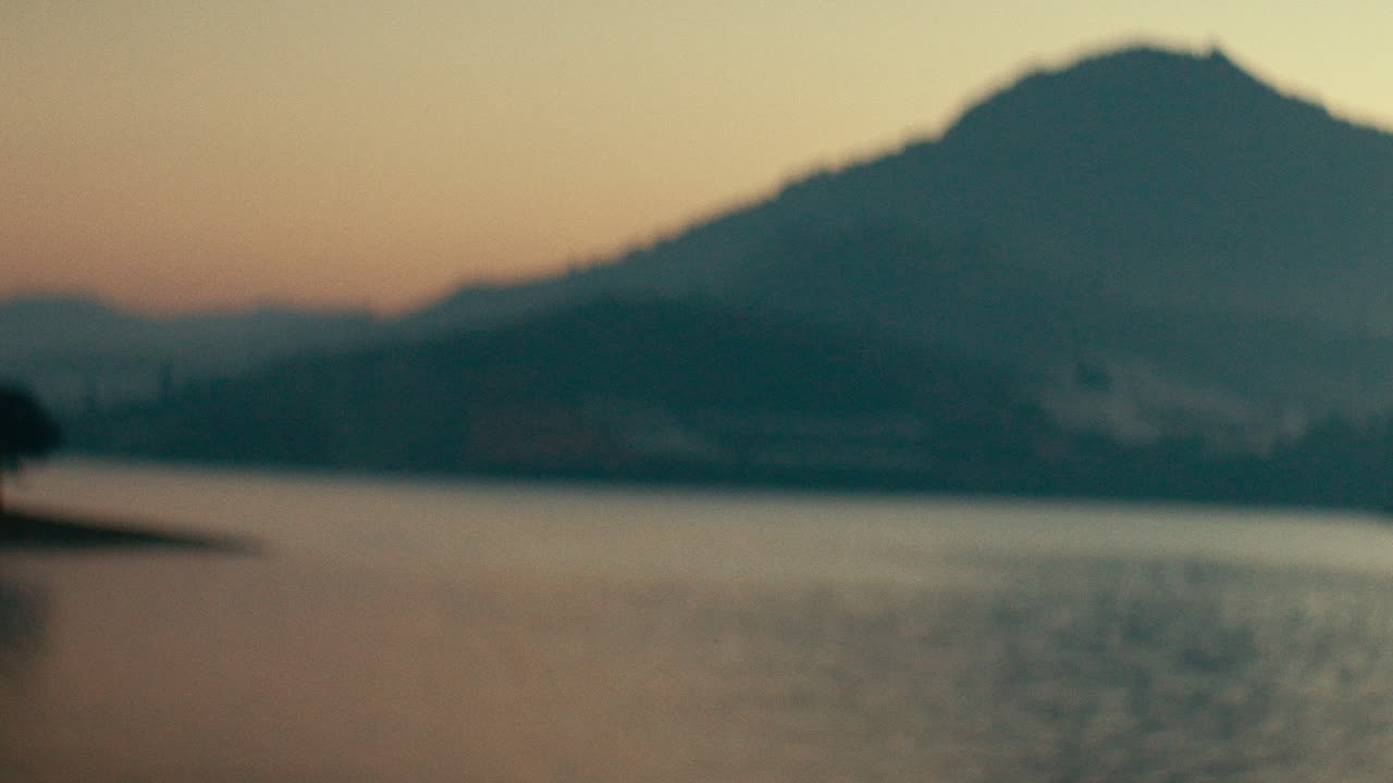 Blurred Mountain Lake Sunrise/Sunset View