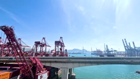 containers and cranes at a bustling port