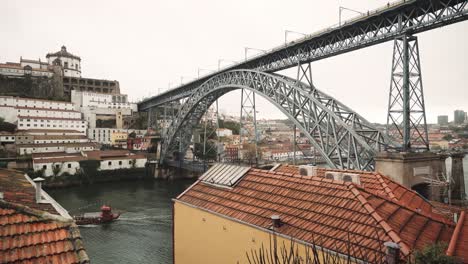 majestic iron dom luis bridge overlooking porto city, static shot.