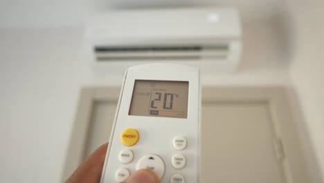 adjusting air conditioner temperature