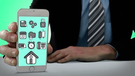 mano que muestra un icono generado digitalmente en un teléfono móvil