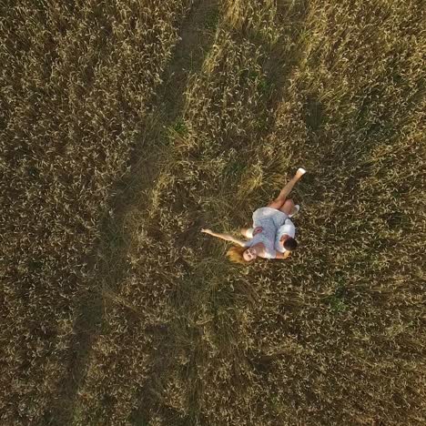 lovers walking in a field