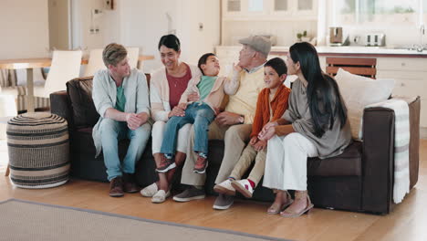 love, speaking and big family having fun on a sofa