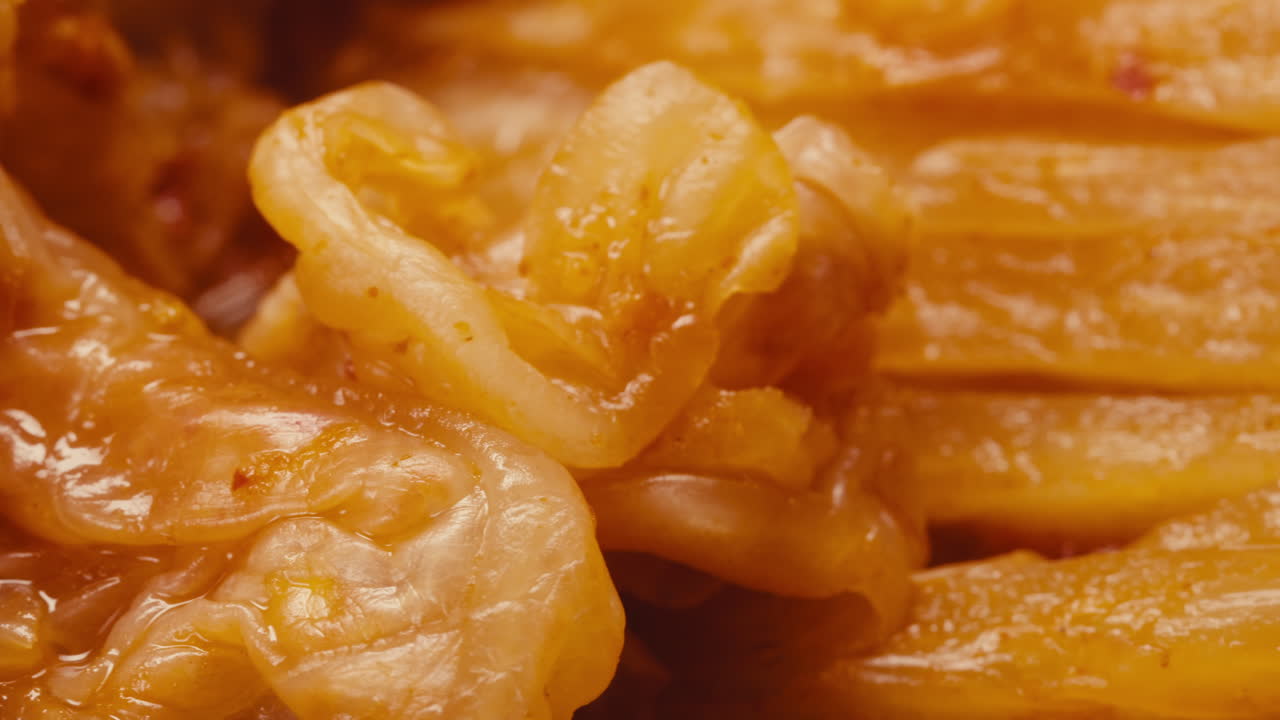 Close-up of texture fermented spicy cabbage kimchi with in can. Preservation of vegetables in glass jars. Fermentation preserved kimchi cabbage with spices macro. Asian cuisine.