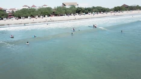 surfers at beach resort