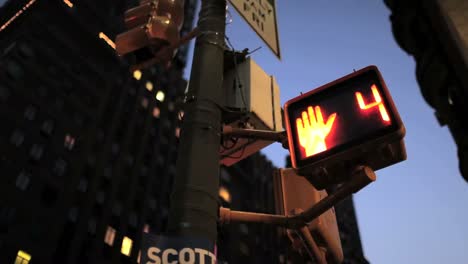 pedestrian crossing countdown sign at an intersection in new york city