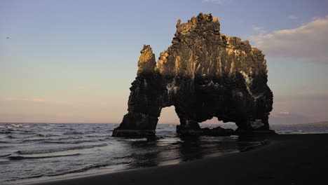 fast pacing timelapse shows close up of hvitserkur rock waves