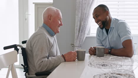 elderly man talking to his caregiver