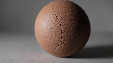 close-up of a brown, cracked egg