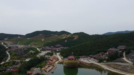 suspension glass bridge at huaxiacheng theme park in weihai china aerial panoramic view