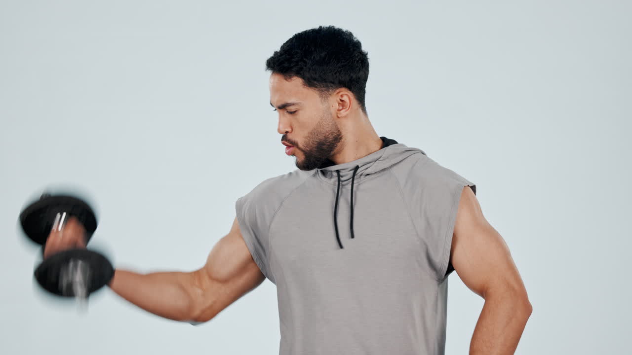 Strong, arm and bodybuilder training in exercise