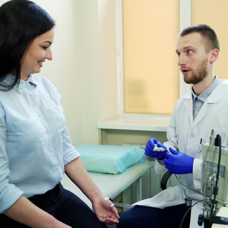 patient during medical consultation. doctor having medical appointment with patient in hospital