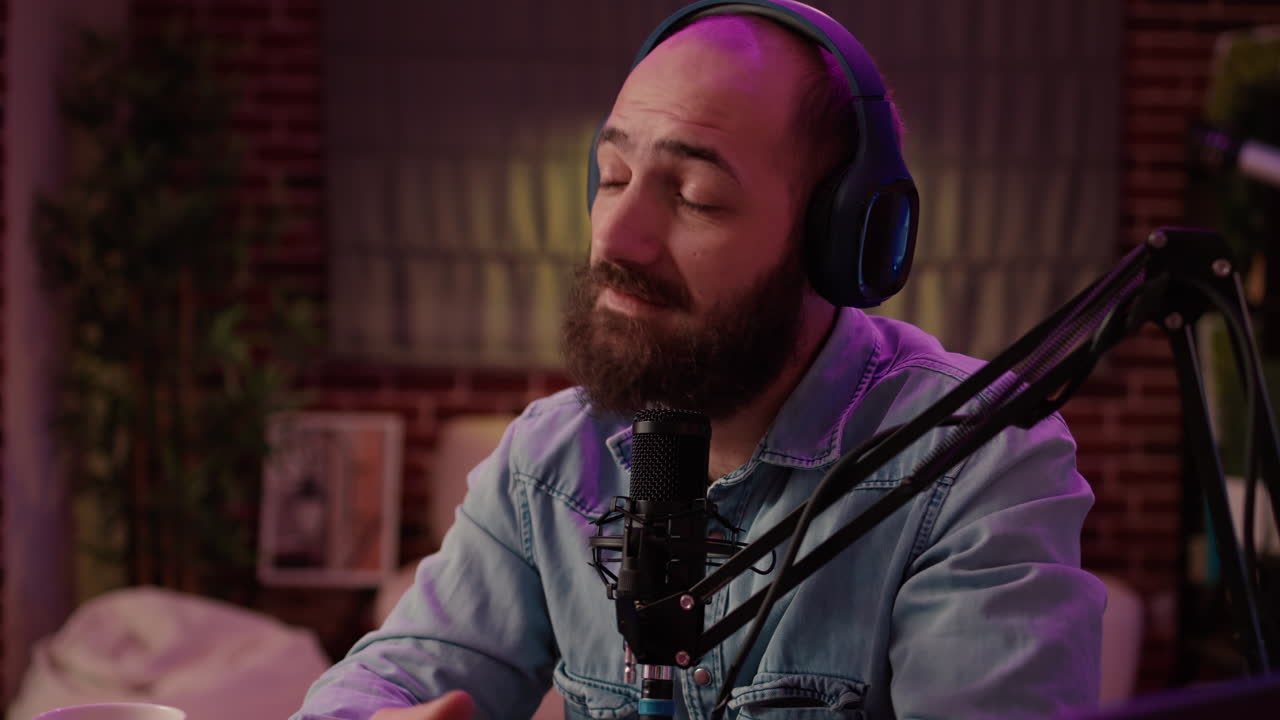 Online radio talkshow host pausing conversation with guest to answer live call from listener