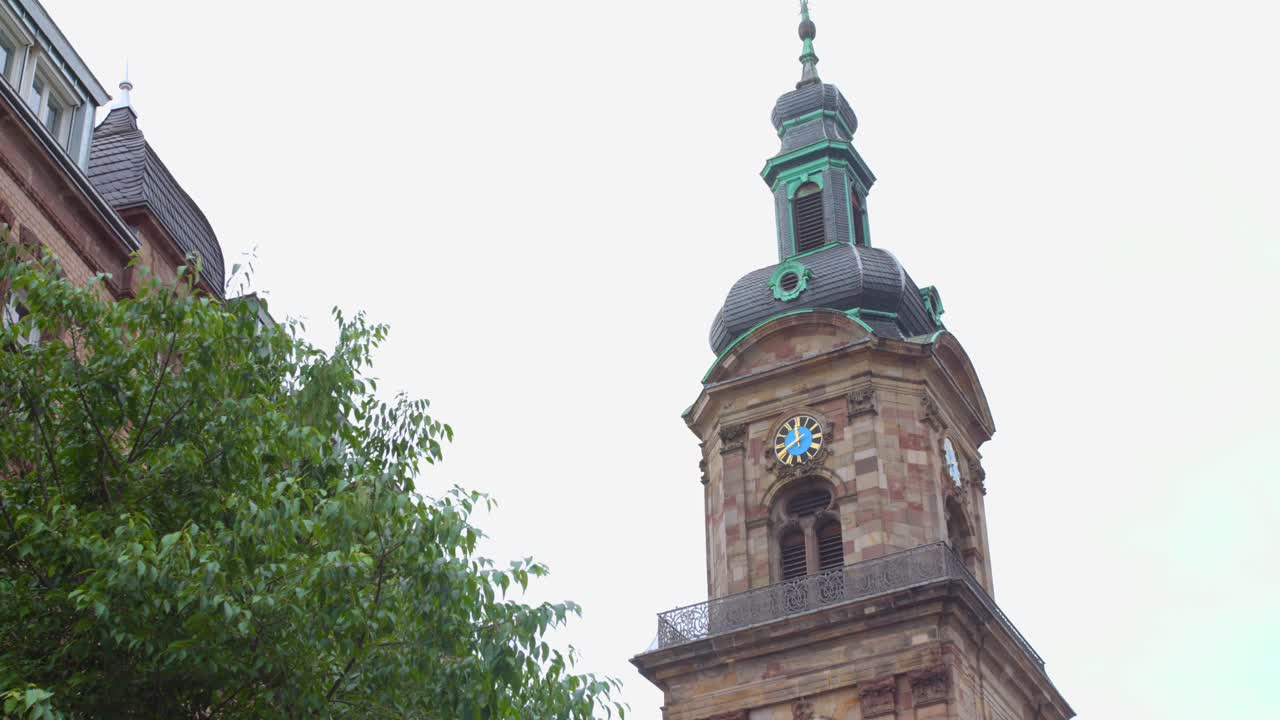 Close-up view of a church tower with a clock