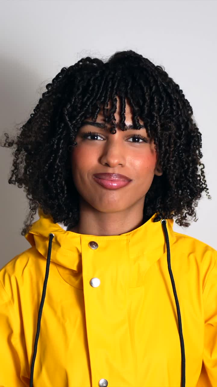 Woman in Yellow Raincoat
