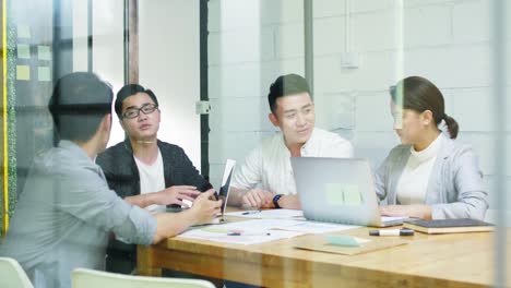 team of asian business people meeting in office