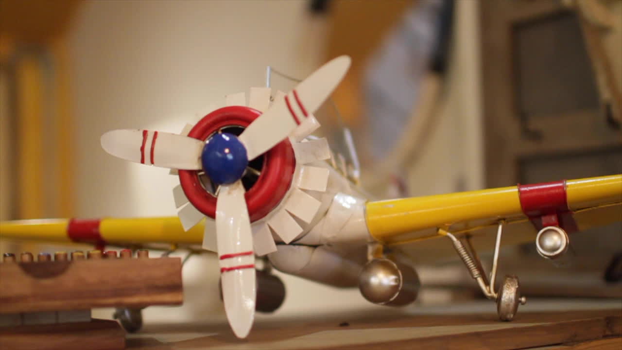 Yellow - Red Toy Airplane on Display
